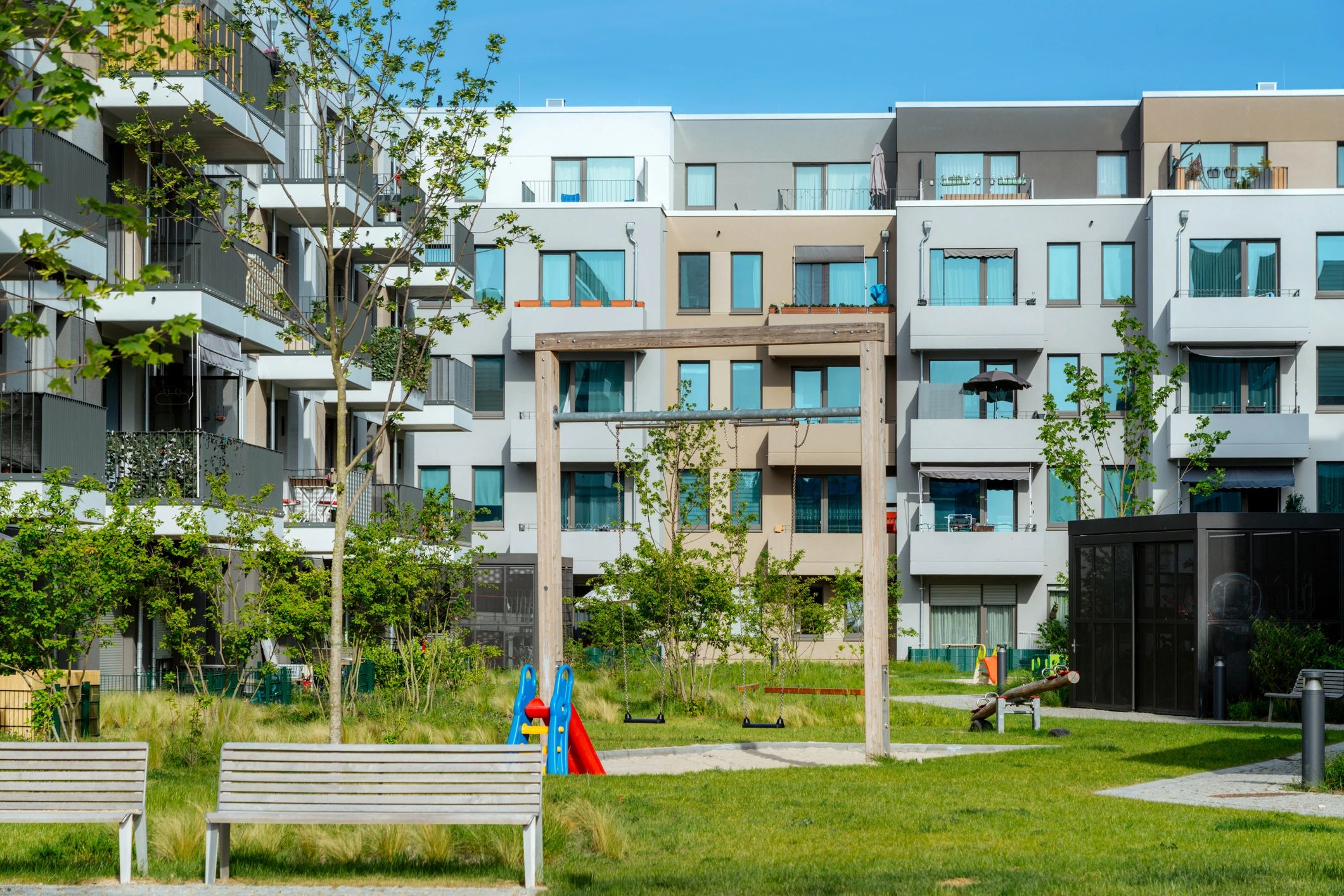 Modern apartment community exterior for multifamily brokerage page